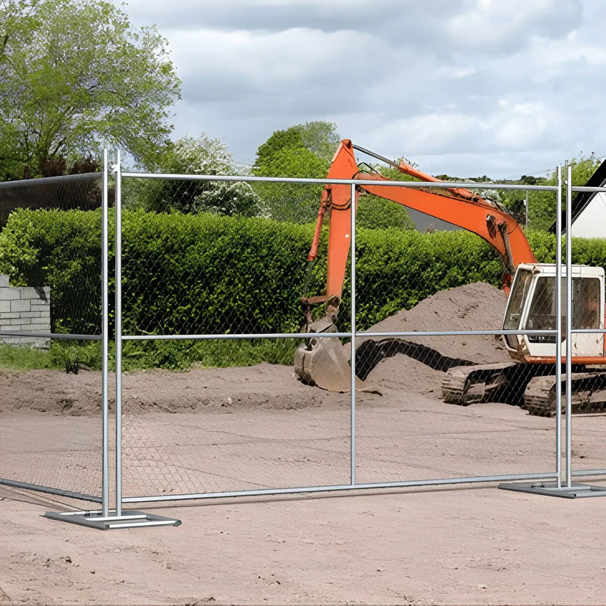Temporary chain link fence panels securing an active construction site